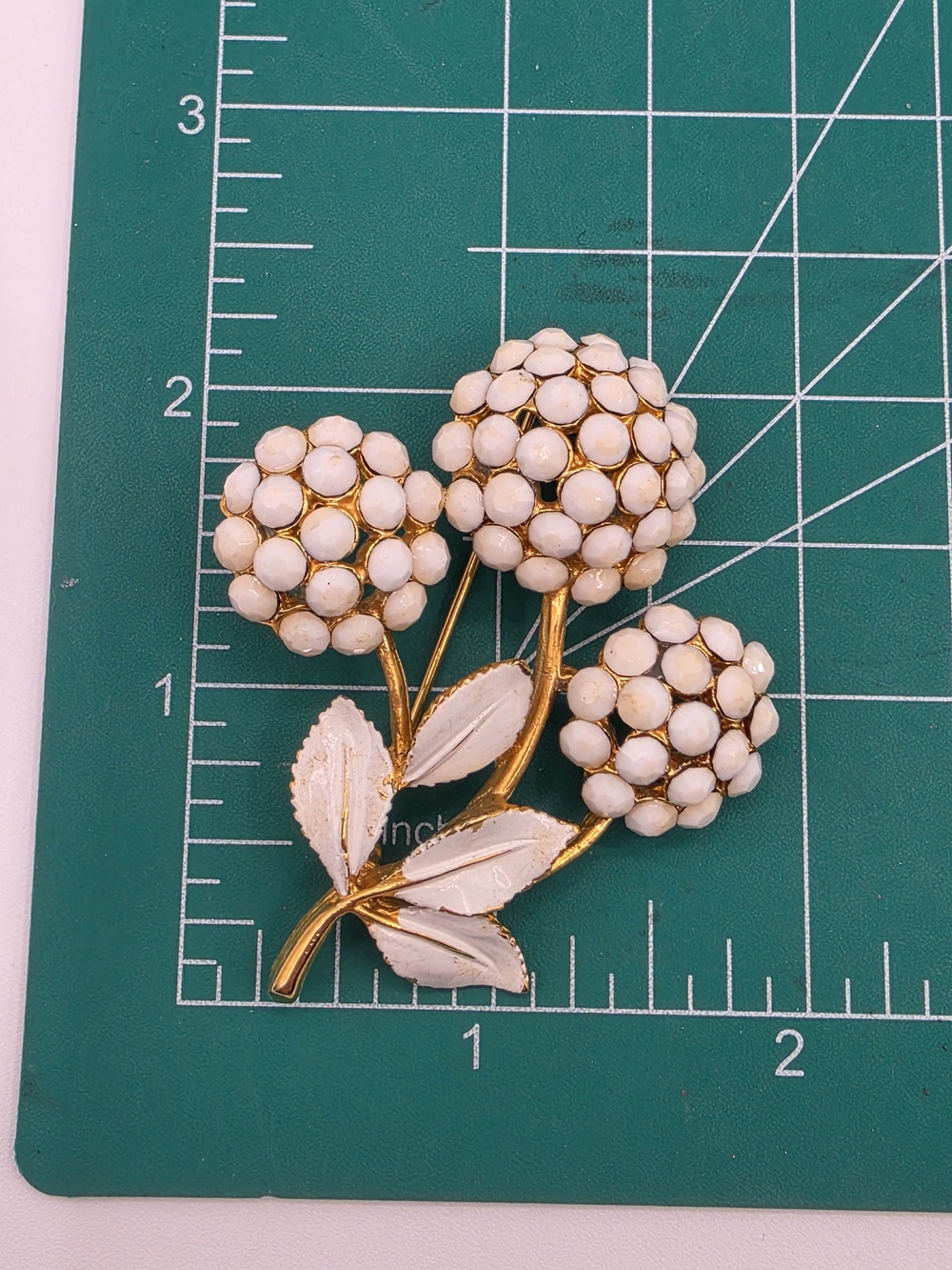 Gold-Tone Floral Cluster Brooch with White Enamel Petals - Picture 11 of 14